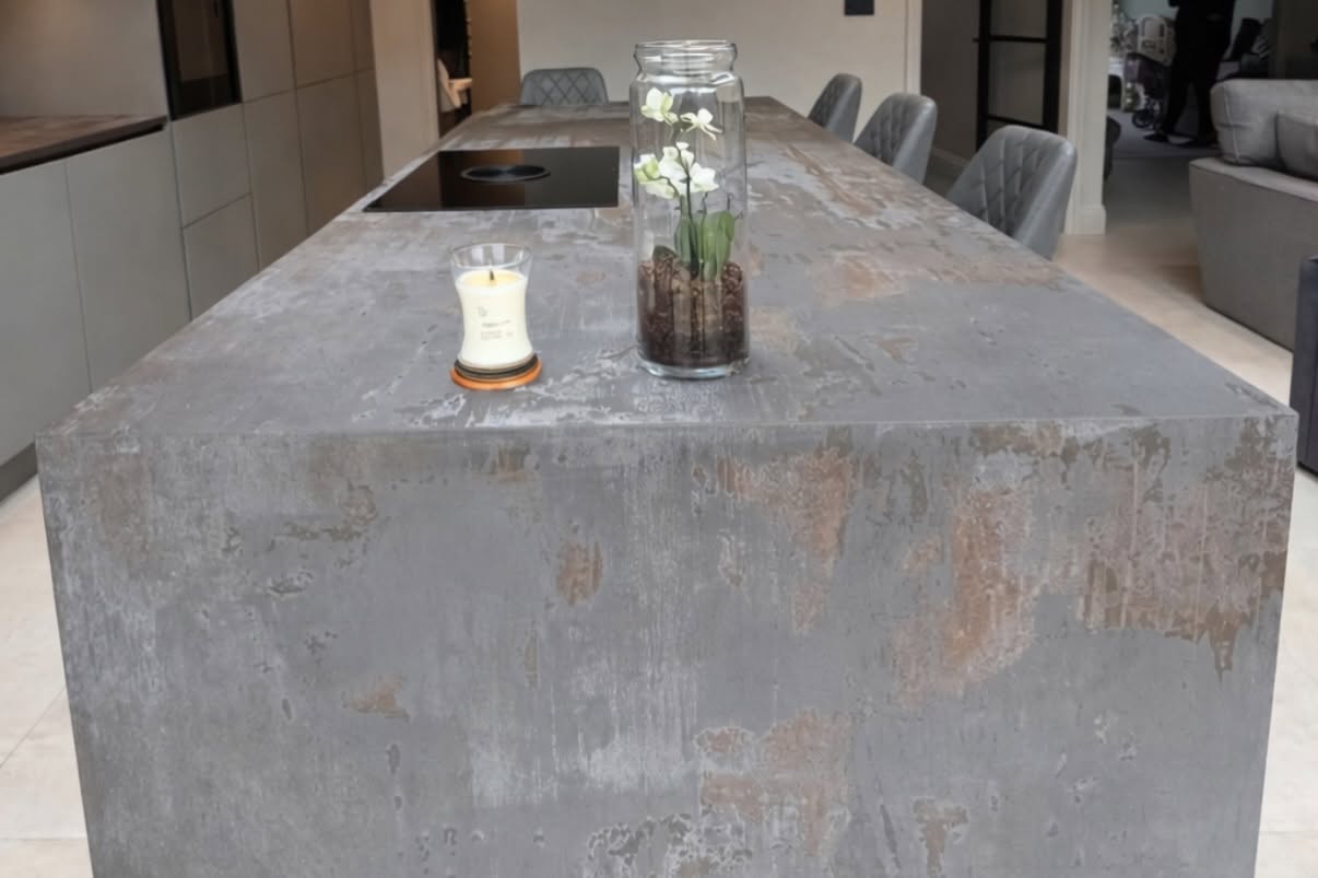 Concrete-effect kitchen island and pendant lighting detail