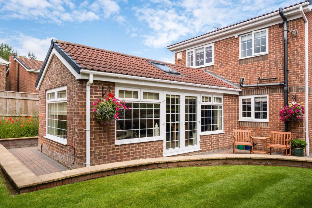 A completed home extension project in Manchester - a brick single storey extension with a Velux roof window
