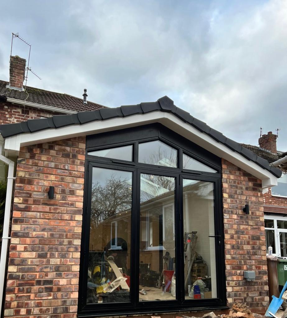 Black patio doors on an extension in Greater Manchester by Ultra Build